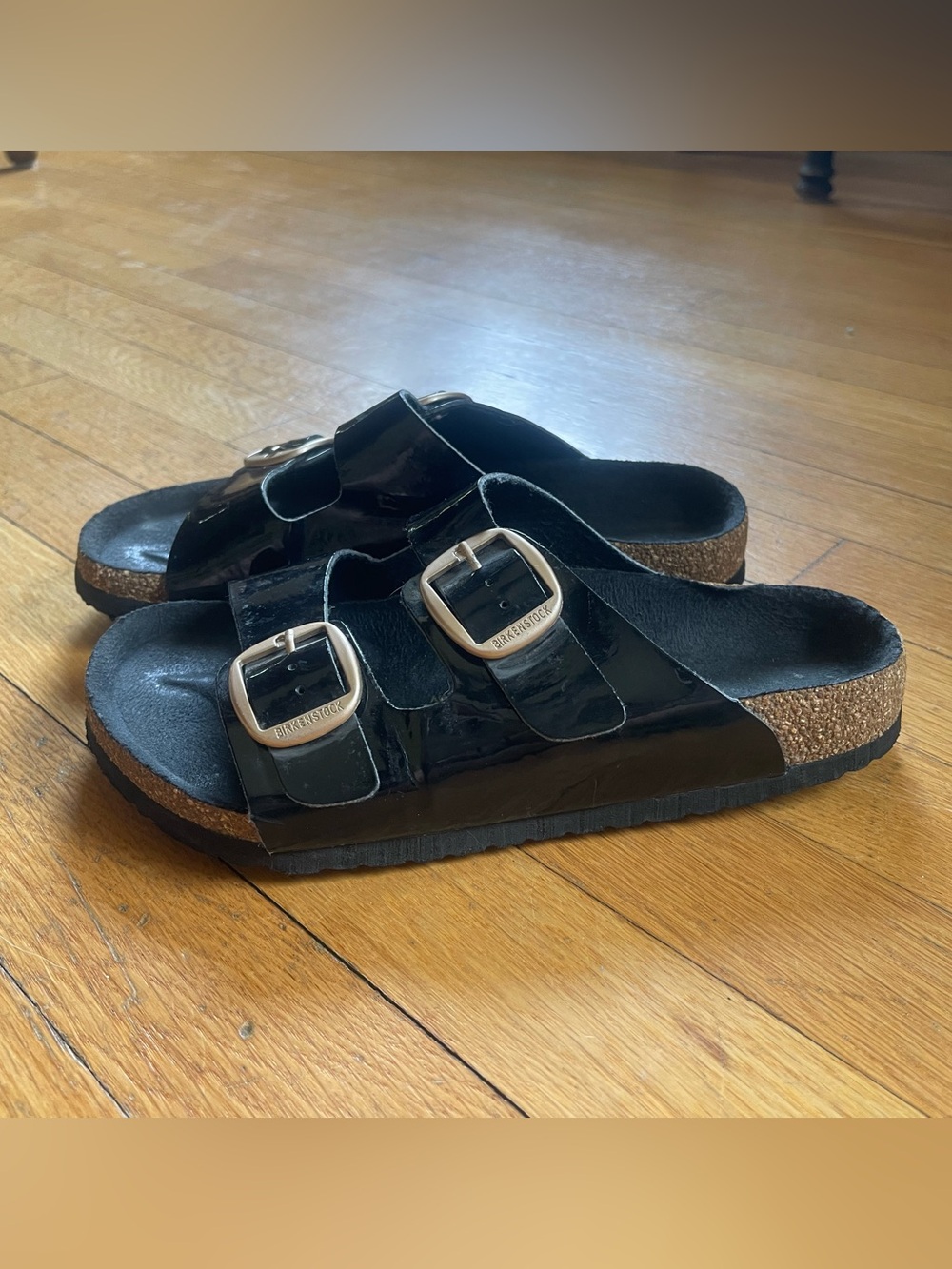 Birkenstock Arizona Patent Slide Sandals in Black with Pale Gold Buckles